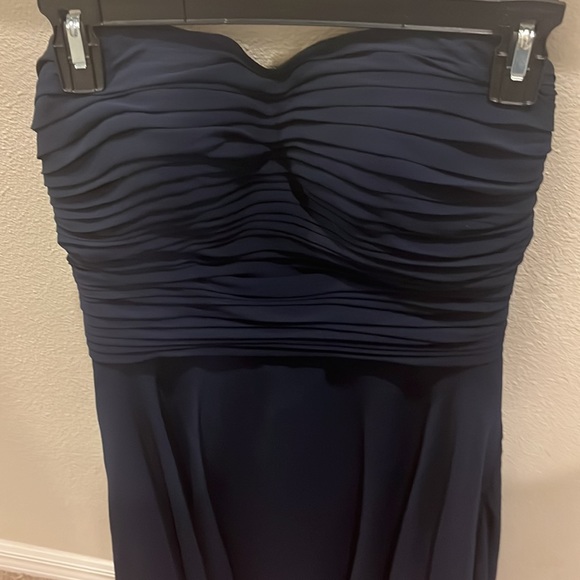 A dark blue strapless dress. It is simple and super cute! - Picture 3 of 3